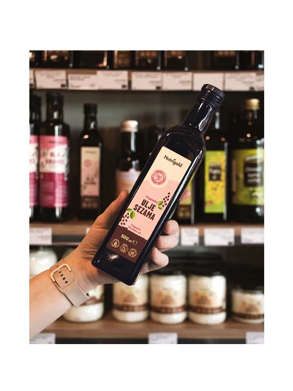 Nutrigold organic cold pressed sesame oil in a dark bottle of 500ml