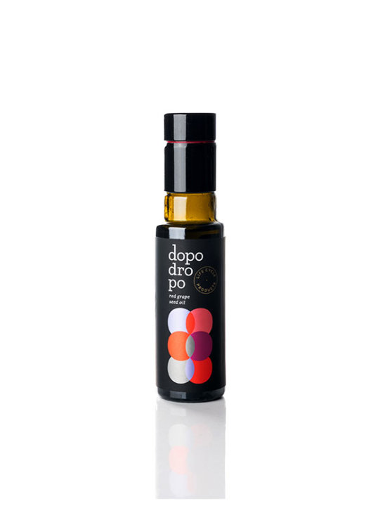 Dopo Dropo cold pressed red grapeseed oil in a dark bottle of 100ml
