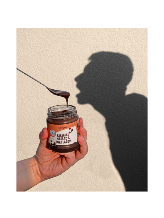 Nutrigold chocolate peanut butter in a round plastic container with a lid of 250g