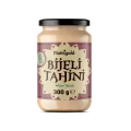 Nutrigold white tahini paste in a glass jar of 300g