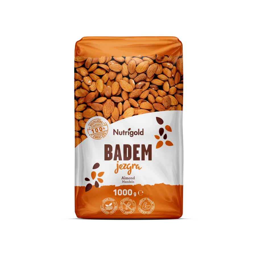 Nutrigold Almond kernels in a transparent plastic container of 1000 grams.